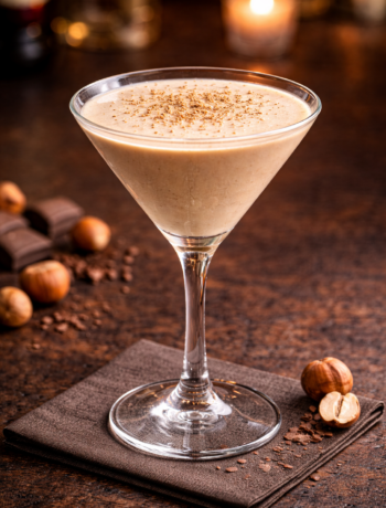 A nutty angel cocktail recipe served in a chilled cocktail glass dusted with nutmeg.