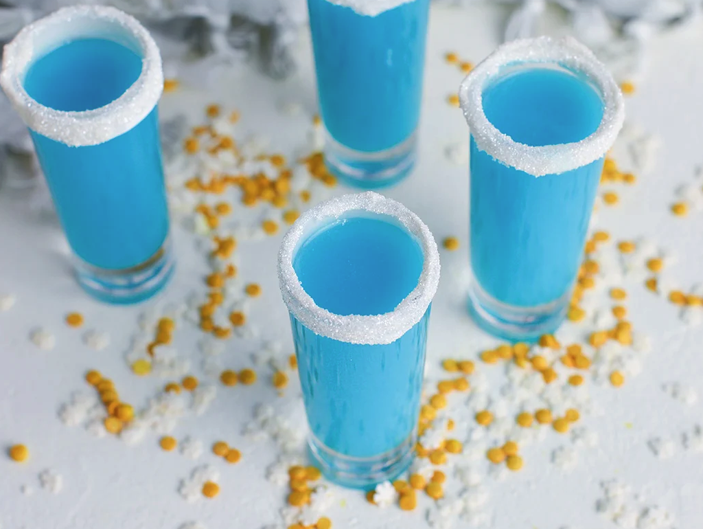 Blue cocktails with sugar rims on table Cocktails, Cocktail Servers, CocktailSevers.com