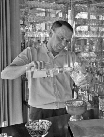 classic cocktails to master arranged on a home bar