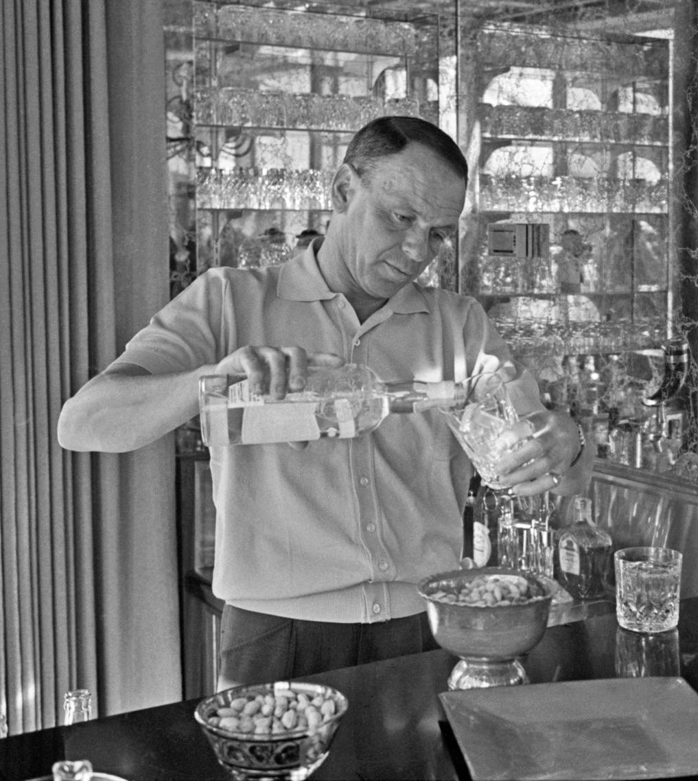classic cocktails to master arranged on a home bar